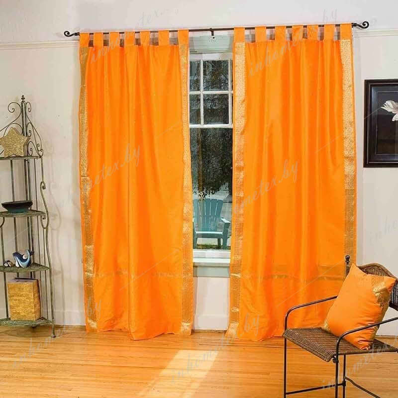 Оранжевые шторы в спальню